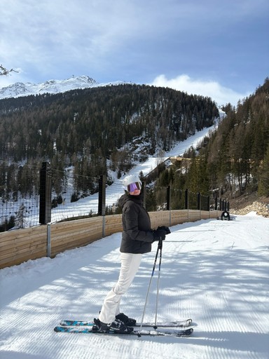 Keren skiing on a snowy mountain trail